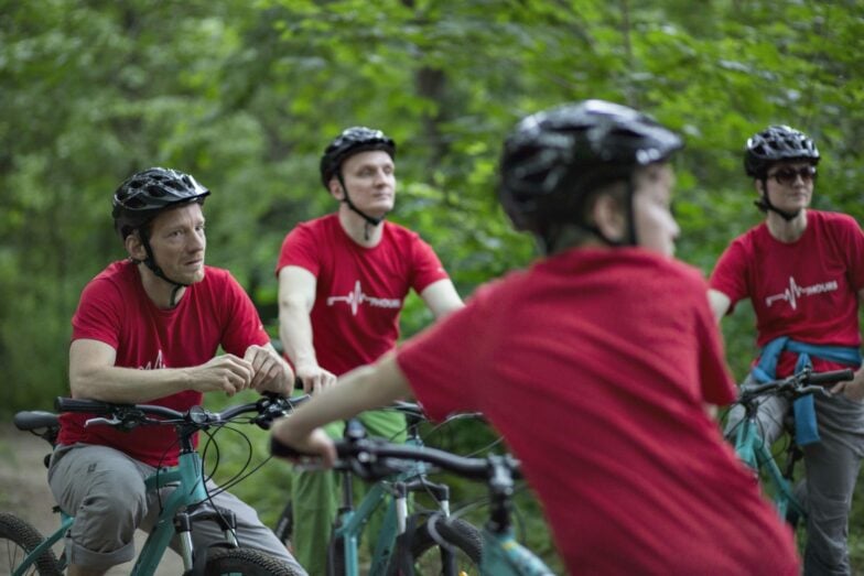 57hours crew learning about mountain biking.