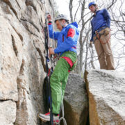 ... and away he goes! Using two jumars and ladders, you quickly ascend the rope, saving strength for your next lead.