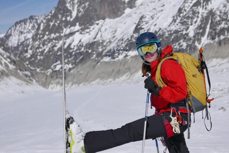 Skier with proper backcountry gear