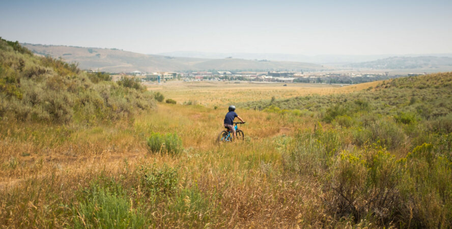 Kid riding mountain bike in Park City, Utah