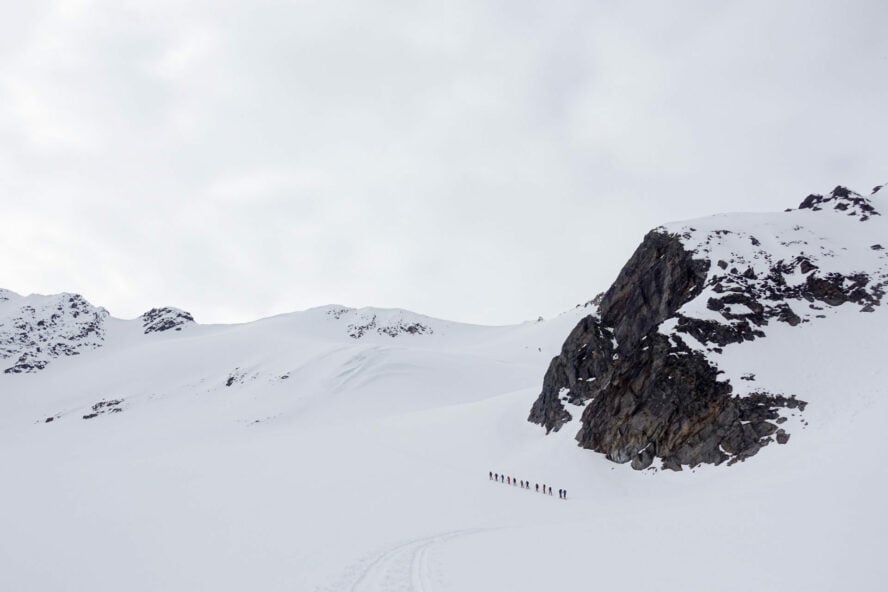 A group making an ascent fo backcountry ski later