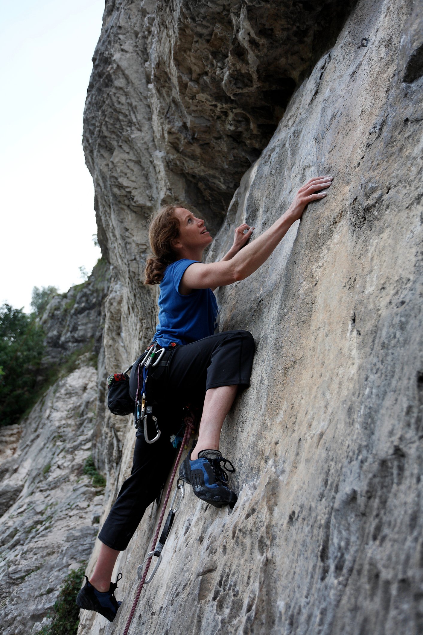 A female climber in the Italian Dolomites