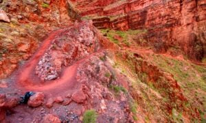 A red path on the Bright Angel Trail.