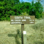 A trail marker in the Los Penasquitos Canyon points the way to the falls.