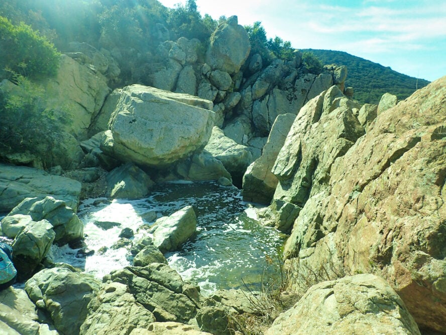 The “waterfall” on the Los Penasquitos trail tumbles over volcanic boulders.