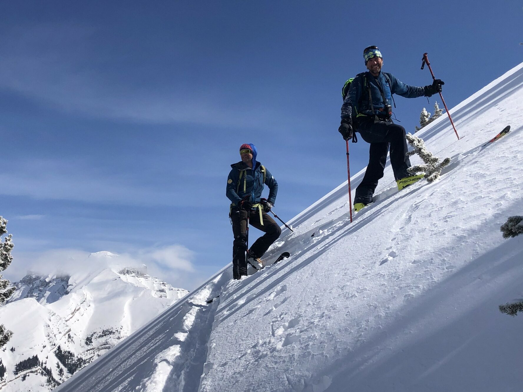 Two skiers skinning up in Golden.