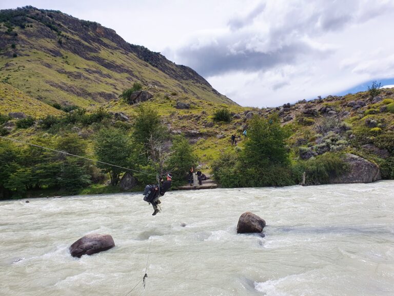 Crossing a river near El Chalten. Photo by Julian Lopez