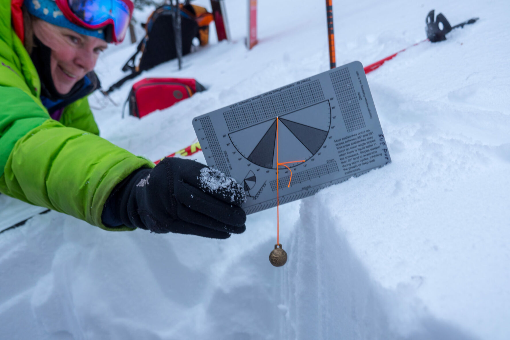 A ski tourer learning about avalanches in Grand Teton National Park