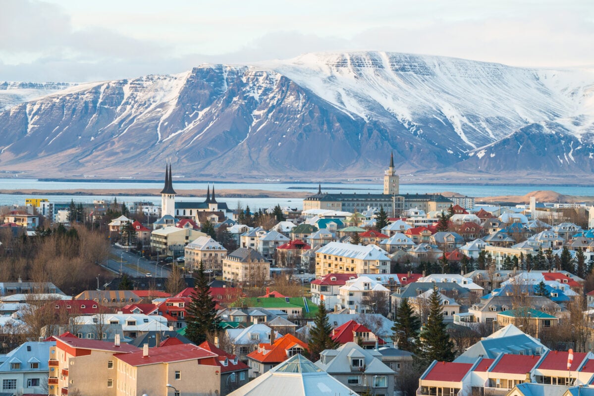 Reykjavik from air with big mountains in the background