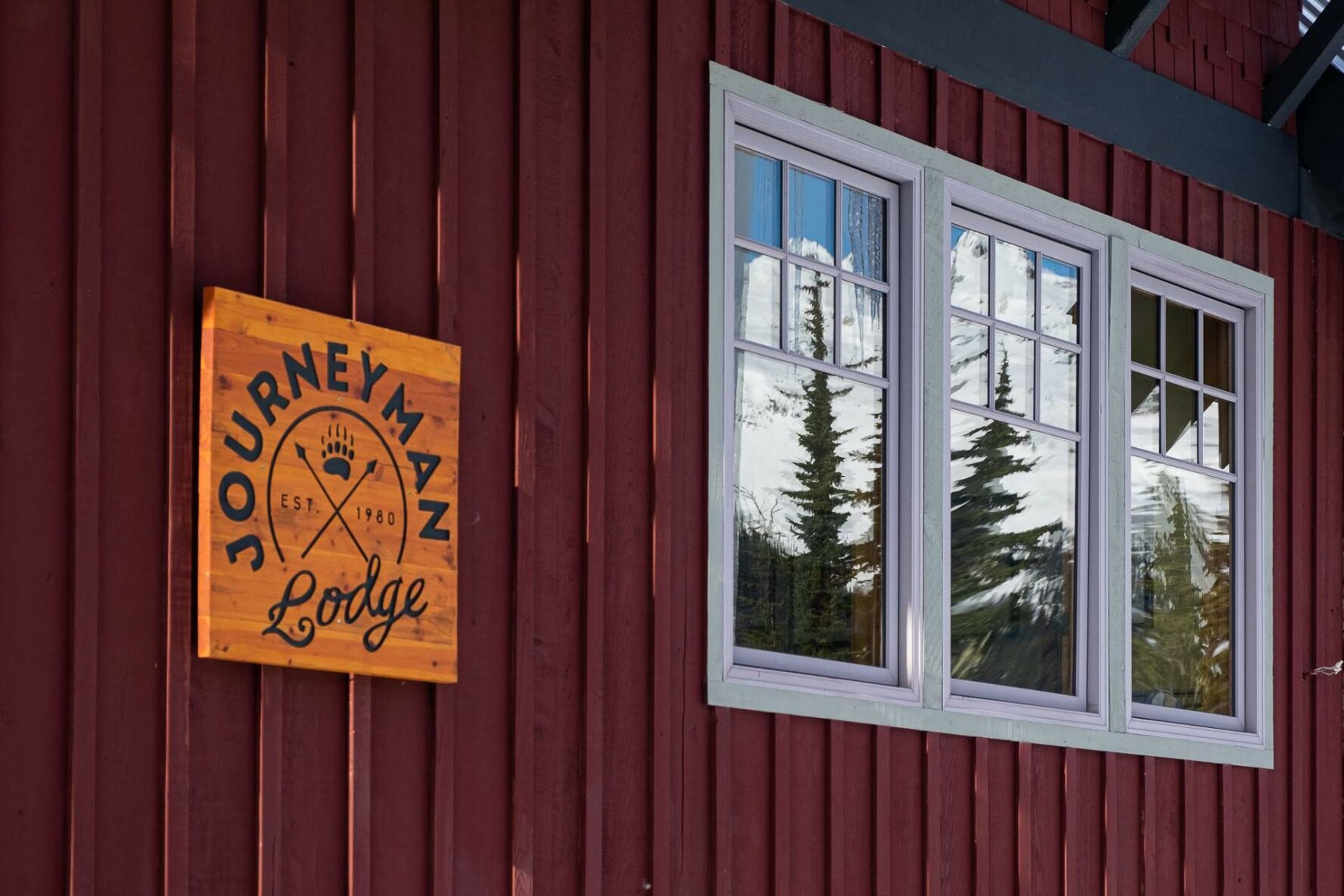 A sign near the entrance to the lodge
