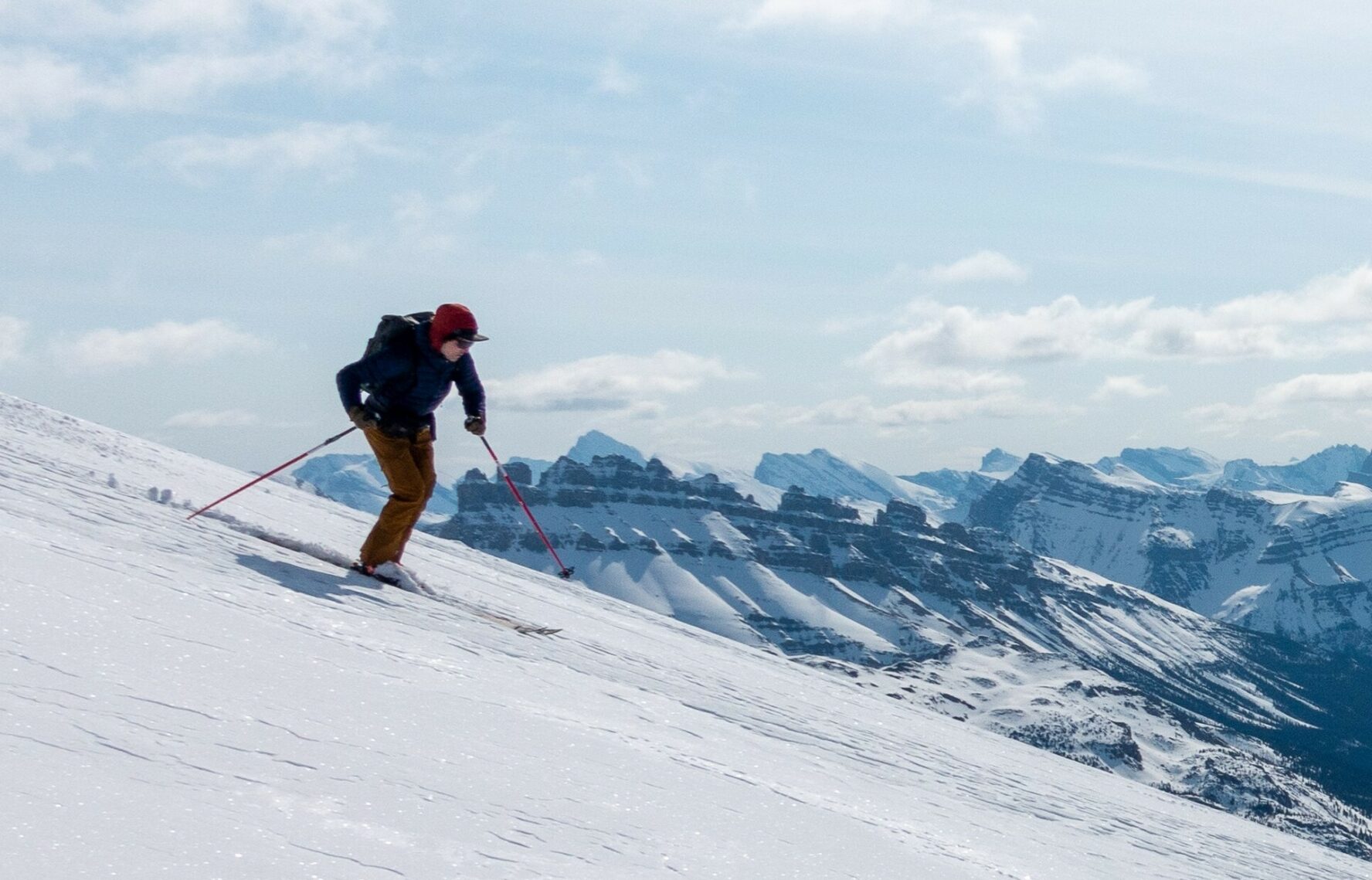 Backcountry skier skiing on the slopes of the mountains around Revelstoke and Golden.