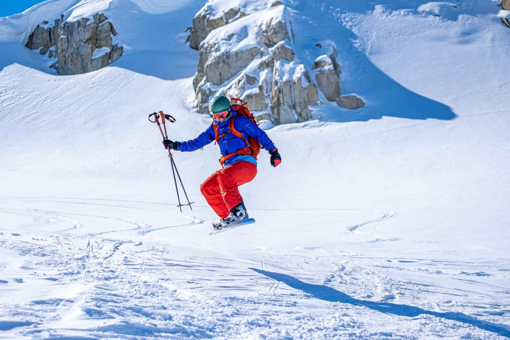 A person splitboarding near Journeyman Lodge