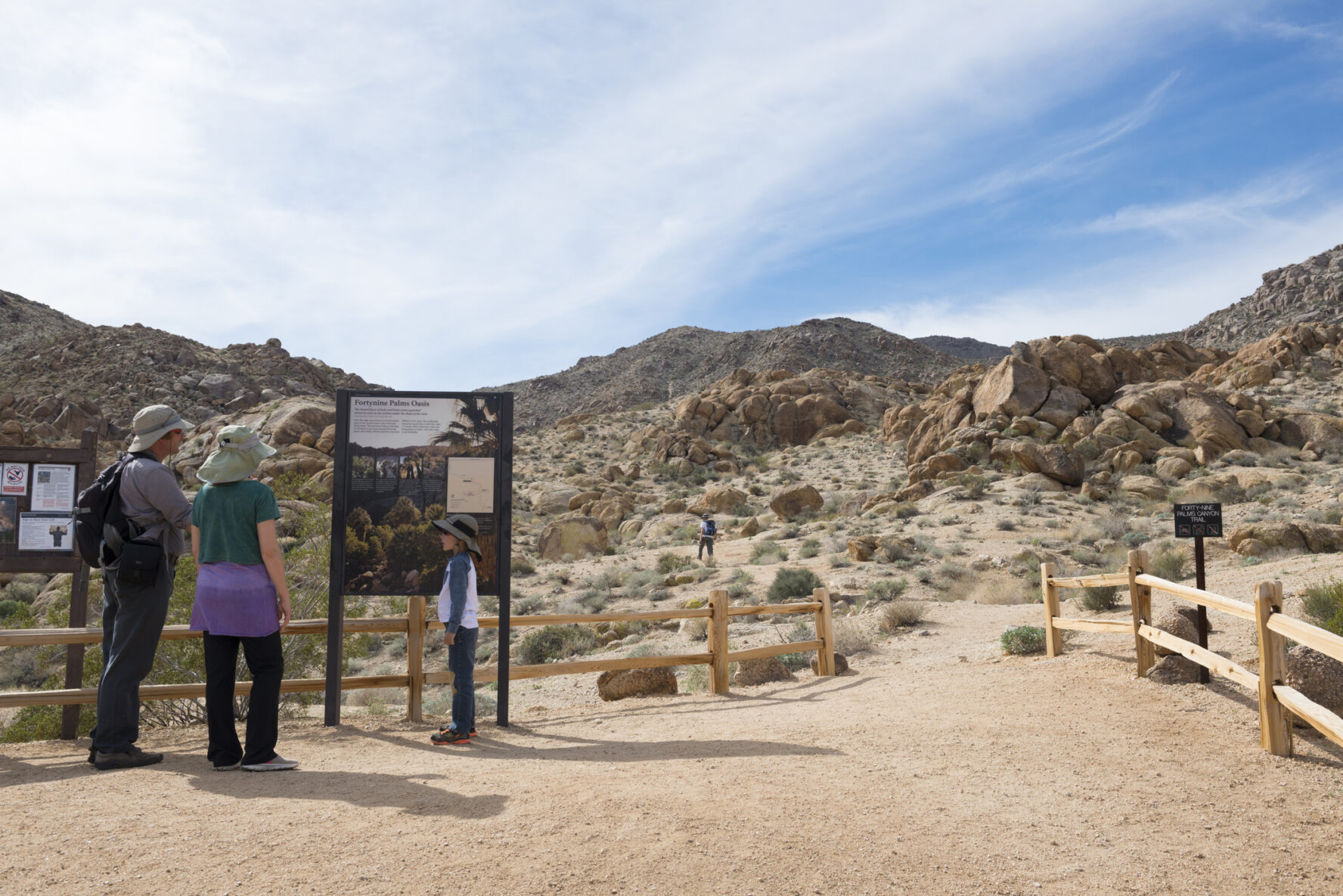 A family hiking in Joshua Tree National Park