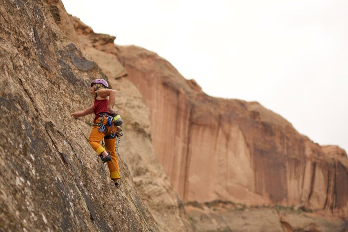 A woman falling while rock climbing in Long Canyon, Moab, Utah Stock Photo  - Alamy