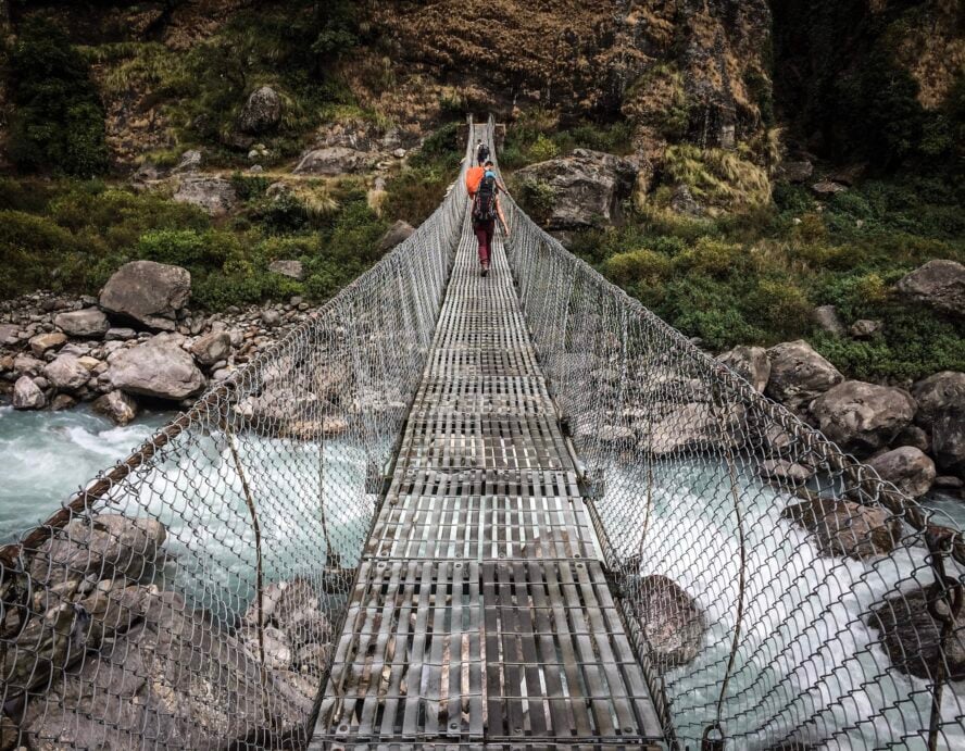 Crossing the Marsyangdi River on one of Nepal’s suspension bridges.