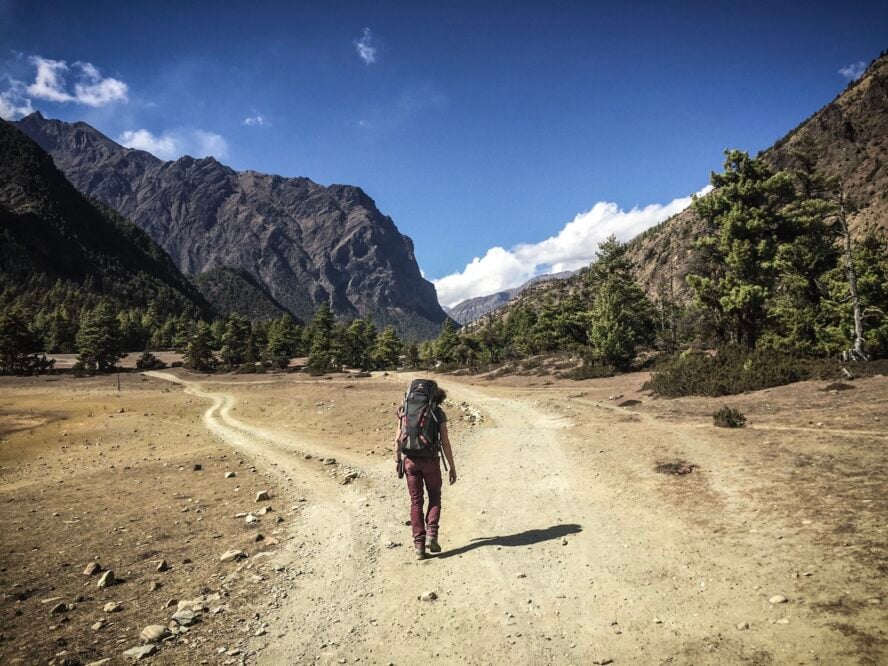 Lone hiker nearing the high-altitude region of Nepal