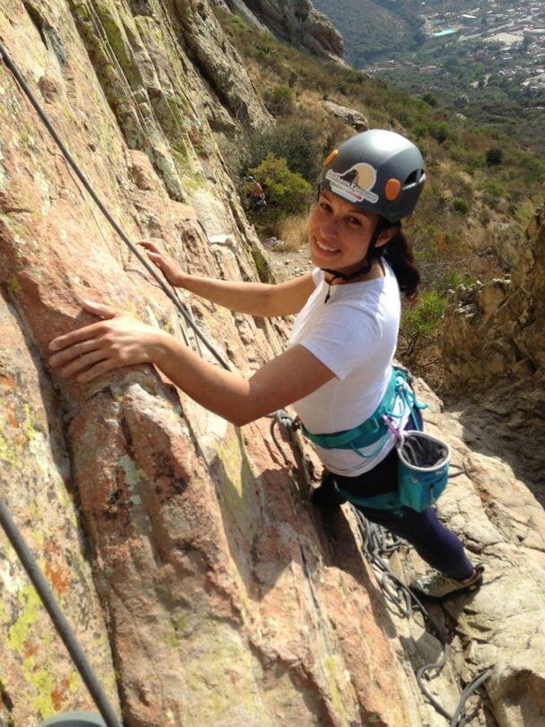Climber climbing with a helmet