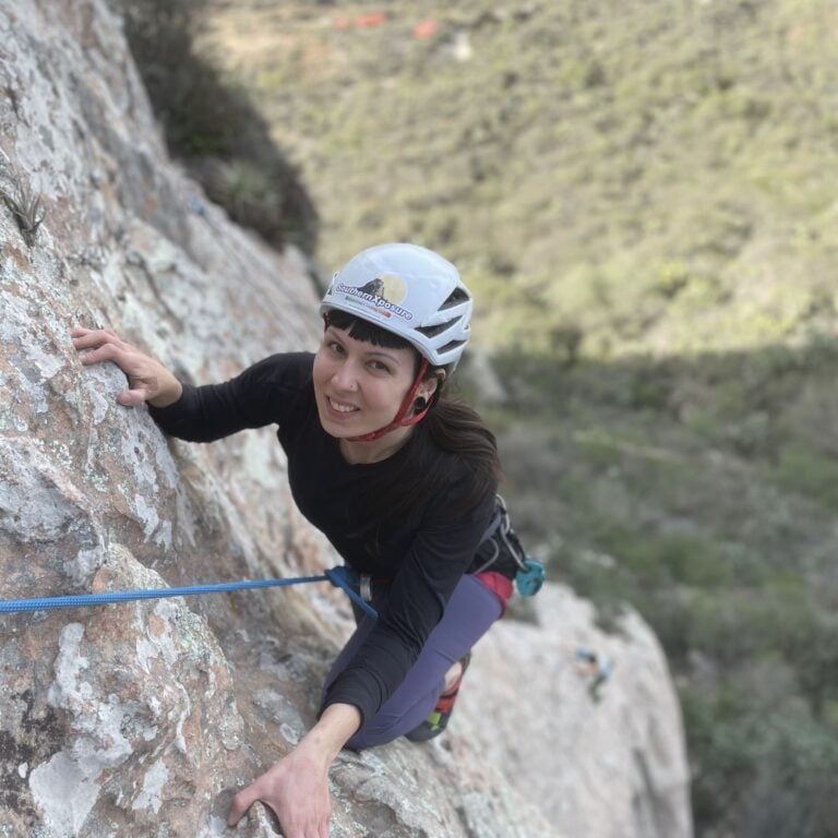 Climber climbing with a helmet
