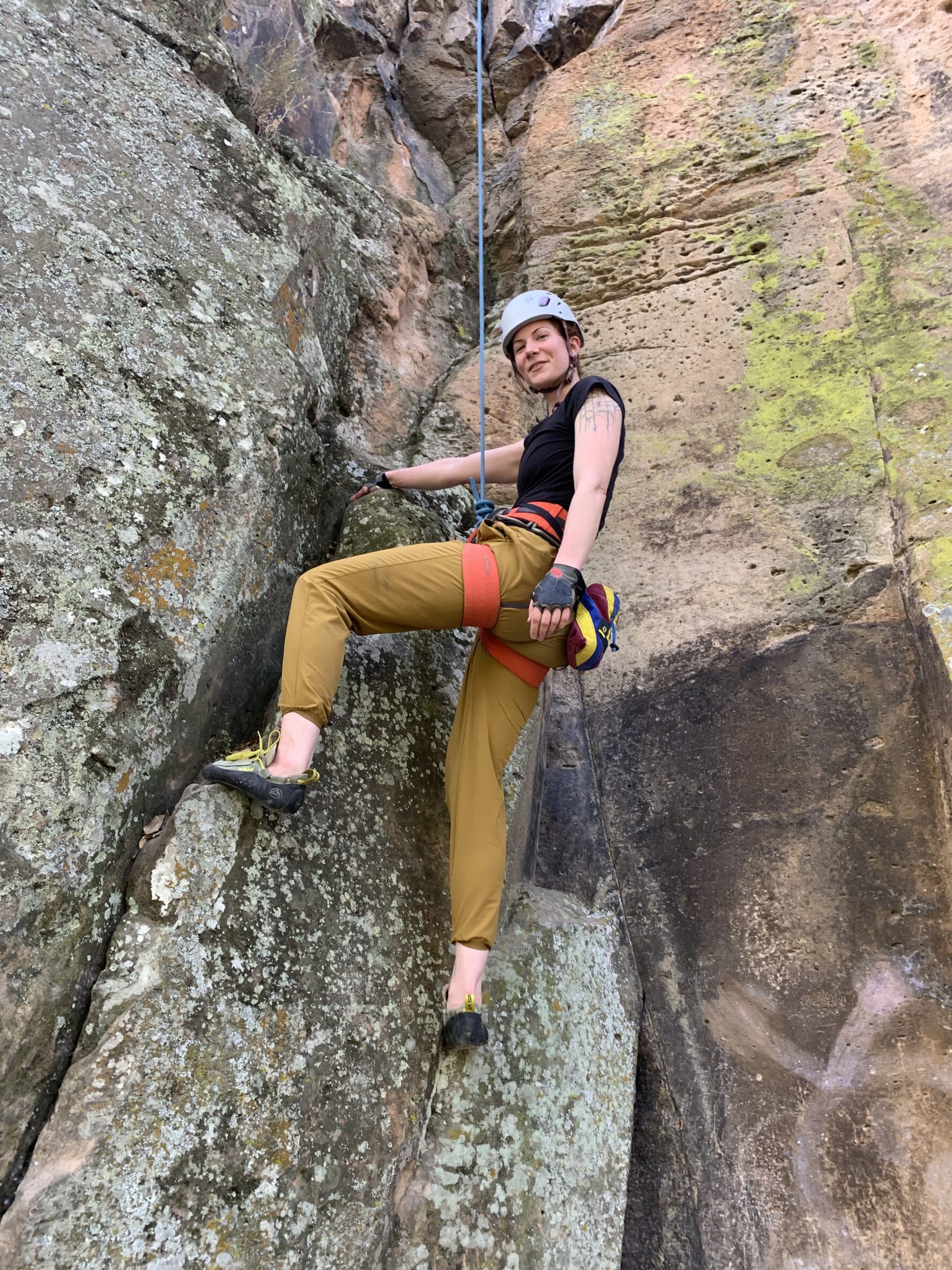 Climber with a rope smiling