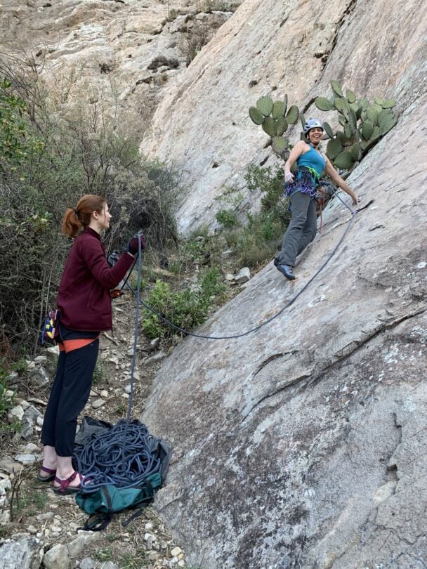 Climber climbing with a helmet