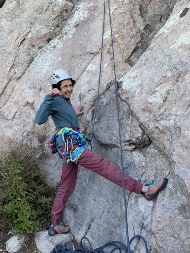 Climber climbing with a helmet