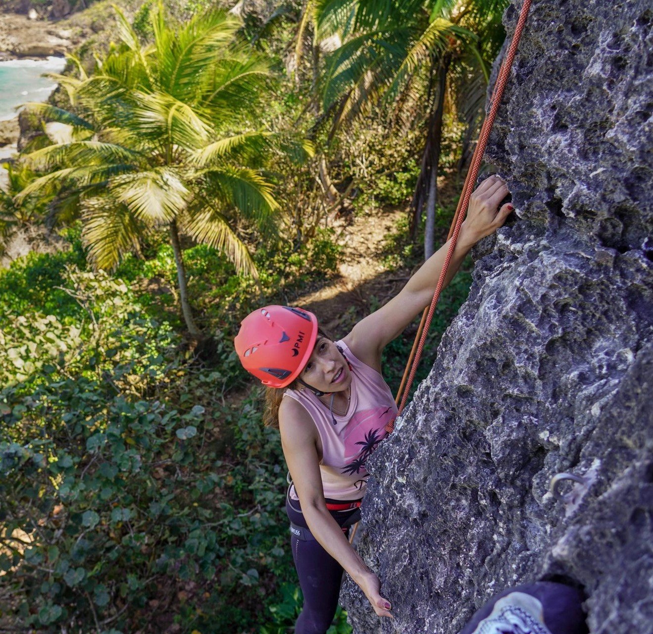 A rock climber on a slab in Puerto Rico