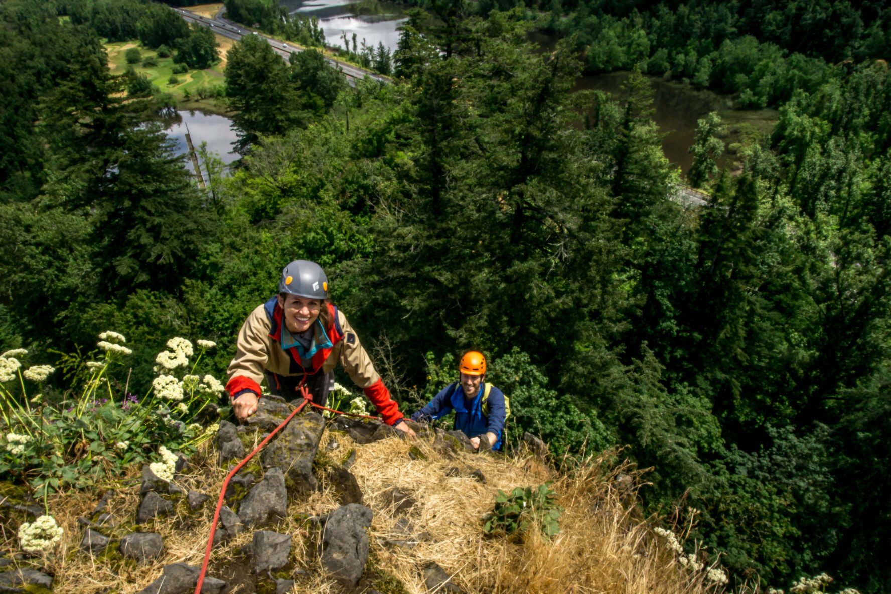People Rock Climbing in Rooster Rock State Park