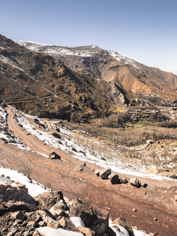 Toubkal national park in springtime with mount, cover by snow and ice, Refuge Toubkal, start point for hike to Jebel Toubkal, – highest peak of Atlas mountains and Morocco