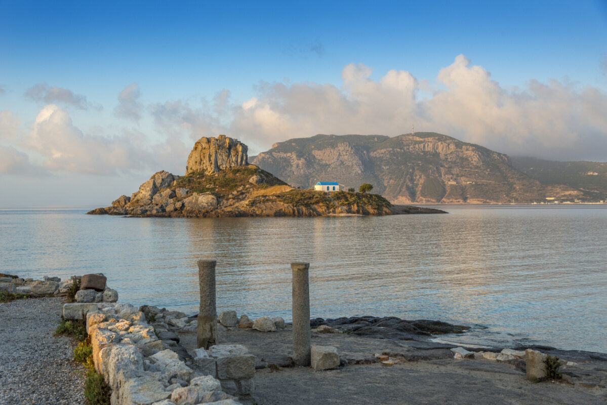 View on little island Kastri near Kos in Kamari bay, Greece