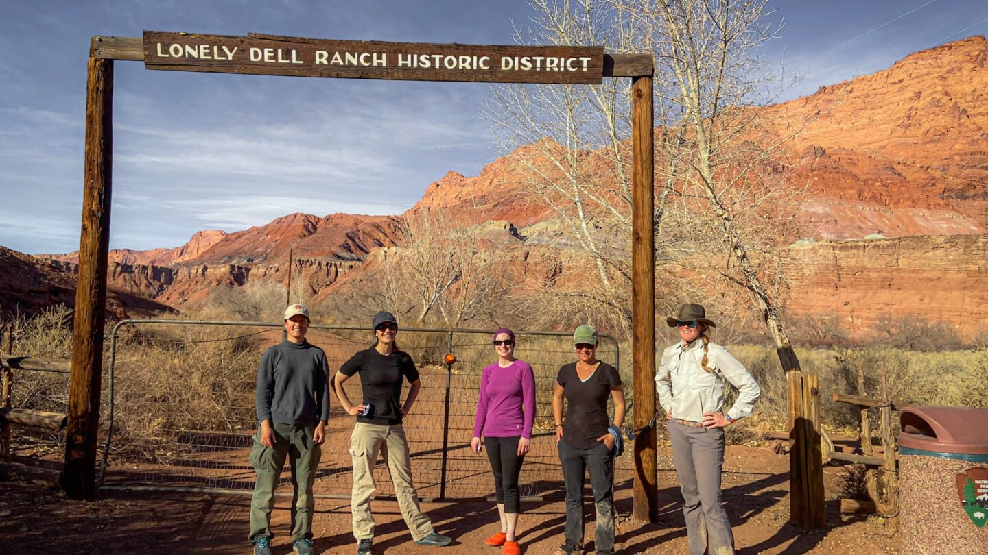 A group of women hiking through the Paria Canyon