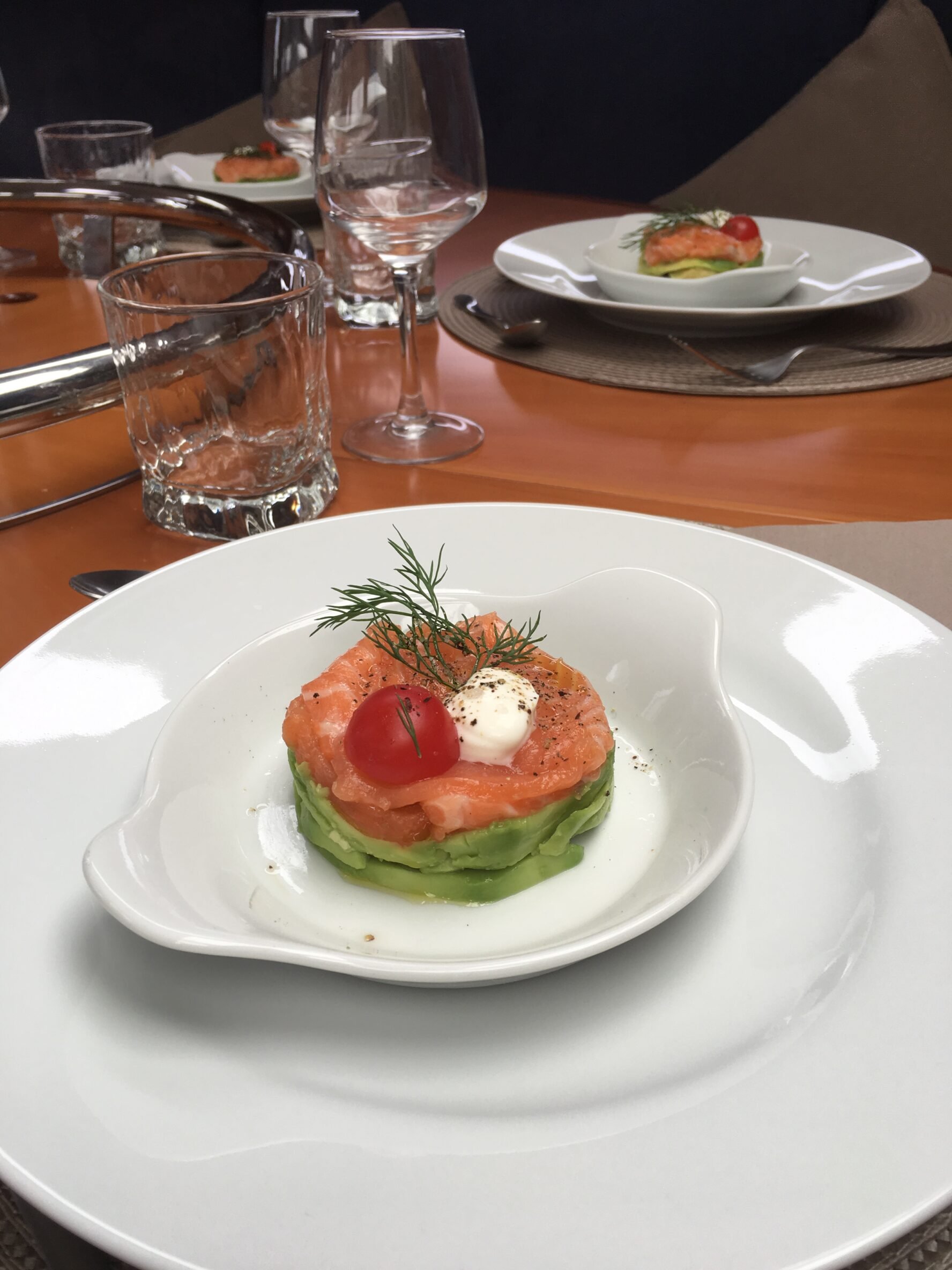 A plate with a fresh warm meal served to skiers on the sailboat