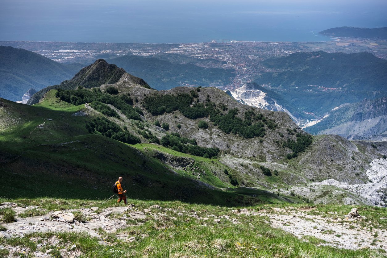 panorama towards the horizon among the wooded valleys on the Apuan Alps of the Tuscan Apennines in italy