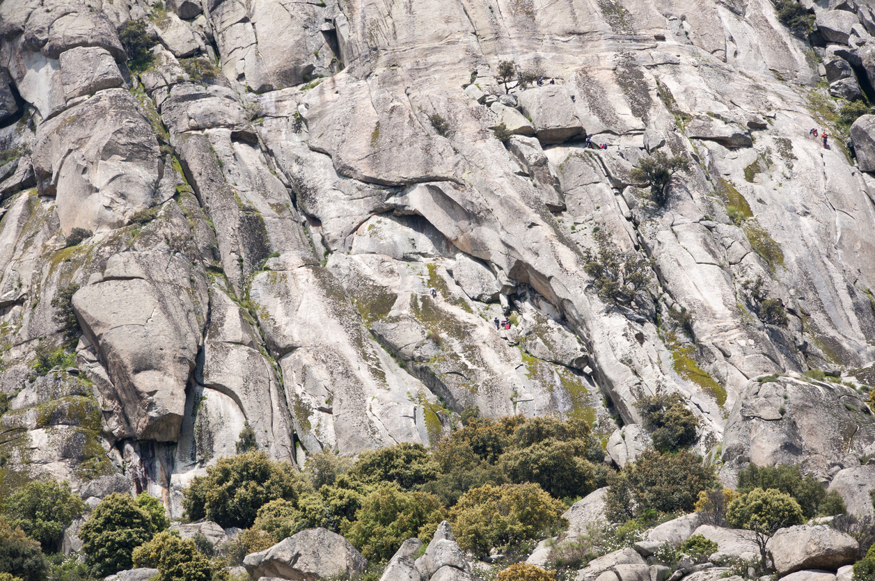 Climbers at Pico de la Miel (Honey Peak), Sierra de la Cabrera, Madrid, Spain