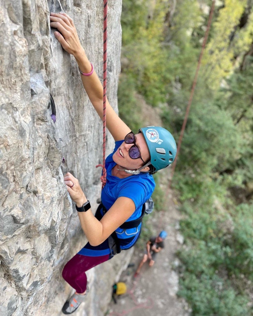 Woman rock climbing in Telluride