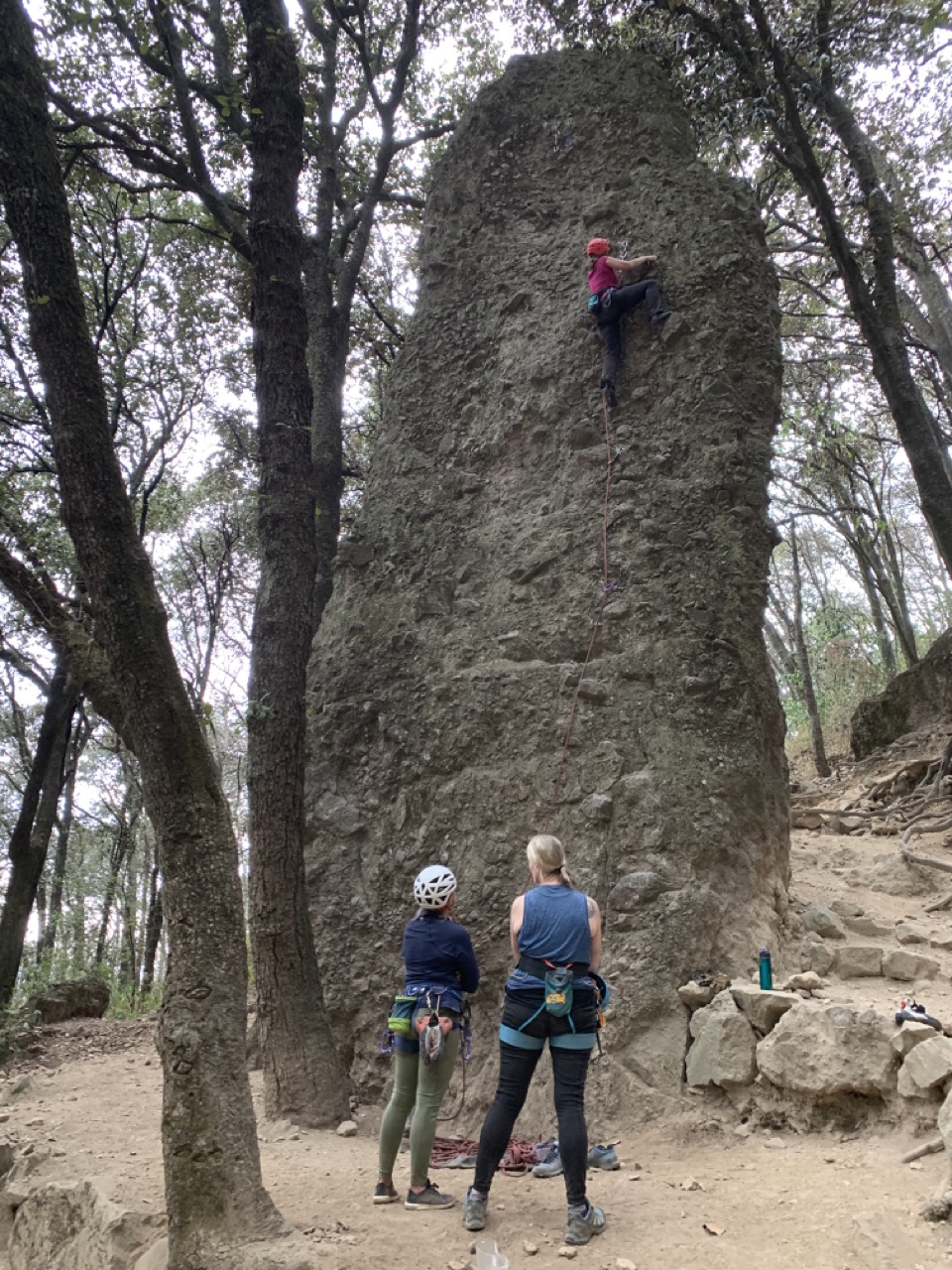 Rock climbing a huge boulder