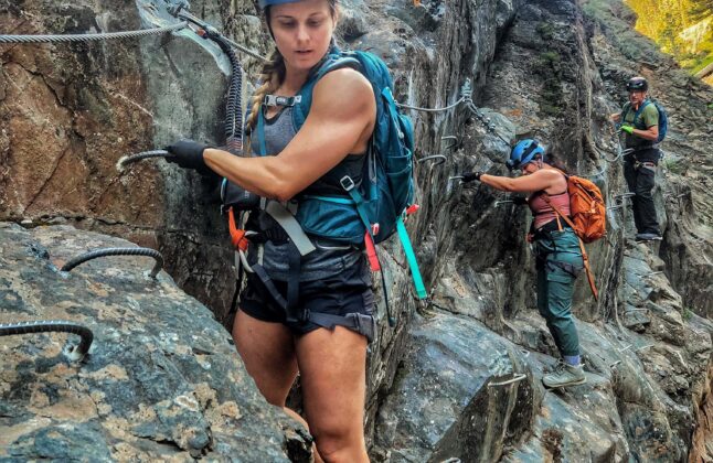 A climber on via ferrata in Ouray