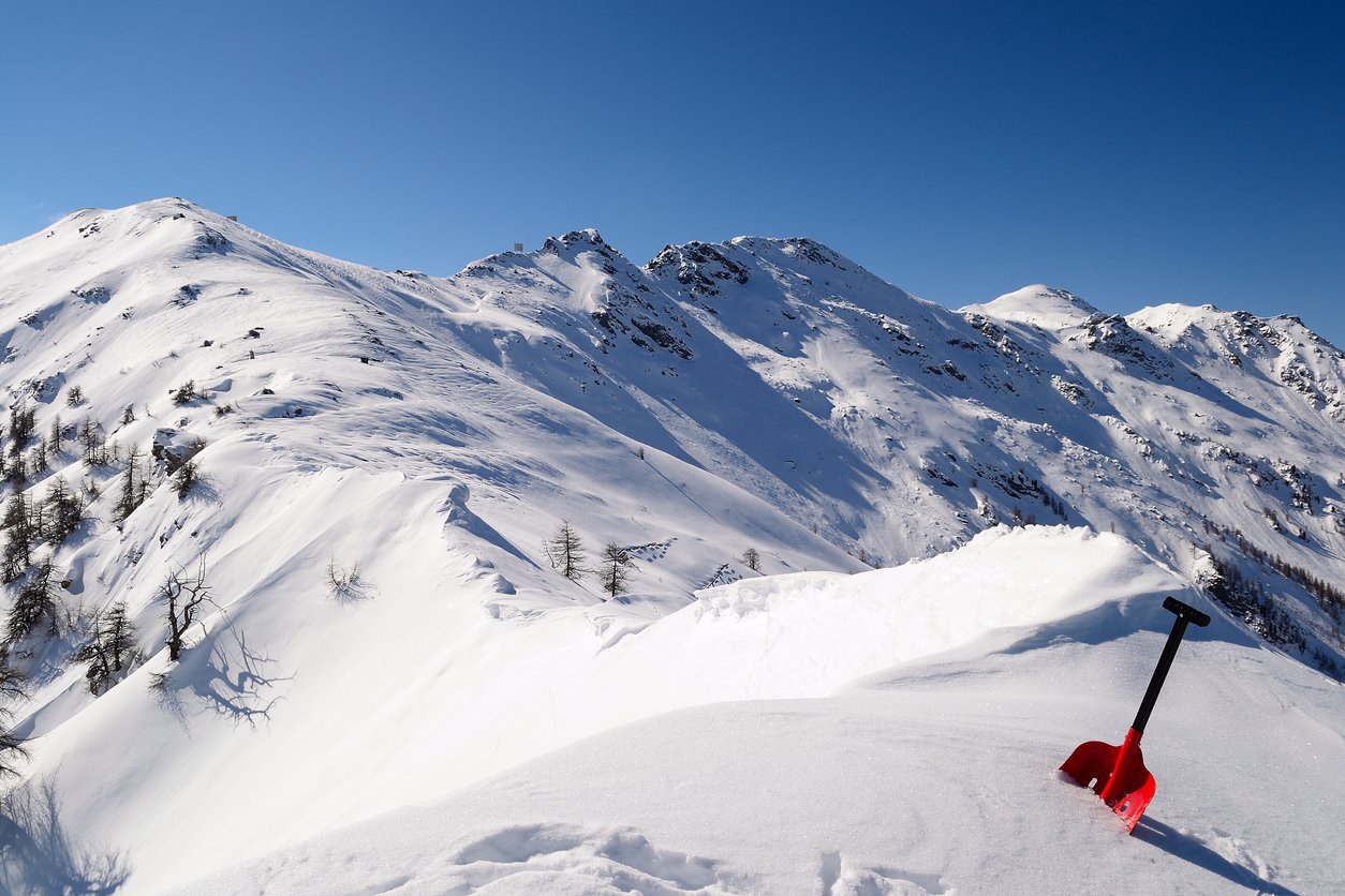 Shovel in deep snowpack of New Hampshire