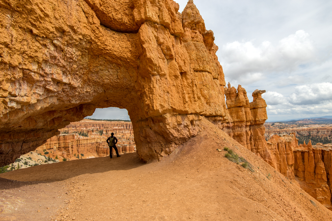 Female hiker walks along path in Bryce Canyon National Park