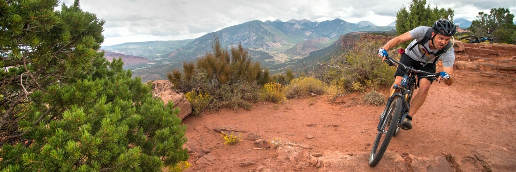 A rider on a trail in Porcupine Rim