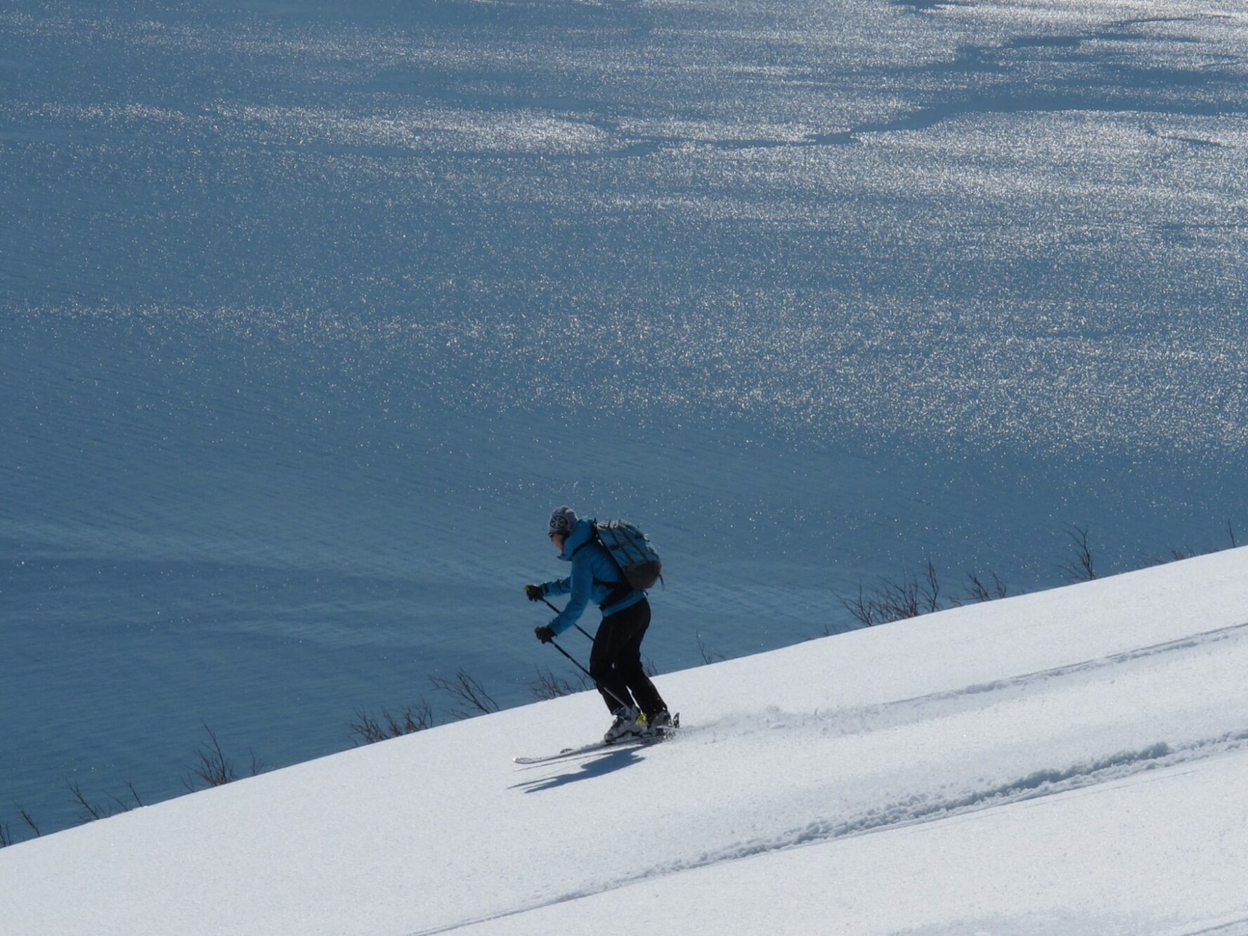 Ski along snowy slopes and ridges