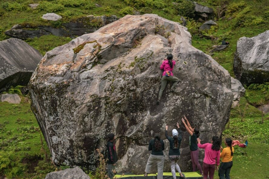 Gowri topping out on the tall boulder just before the panic moments