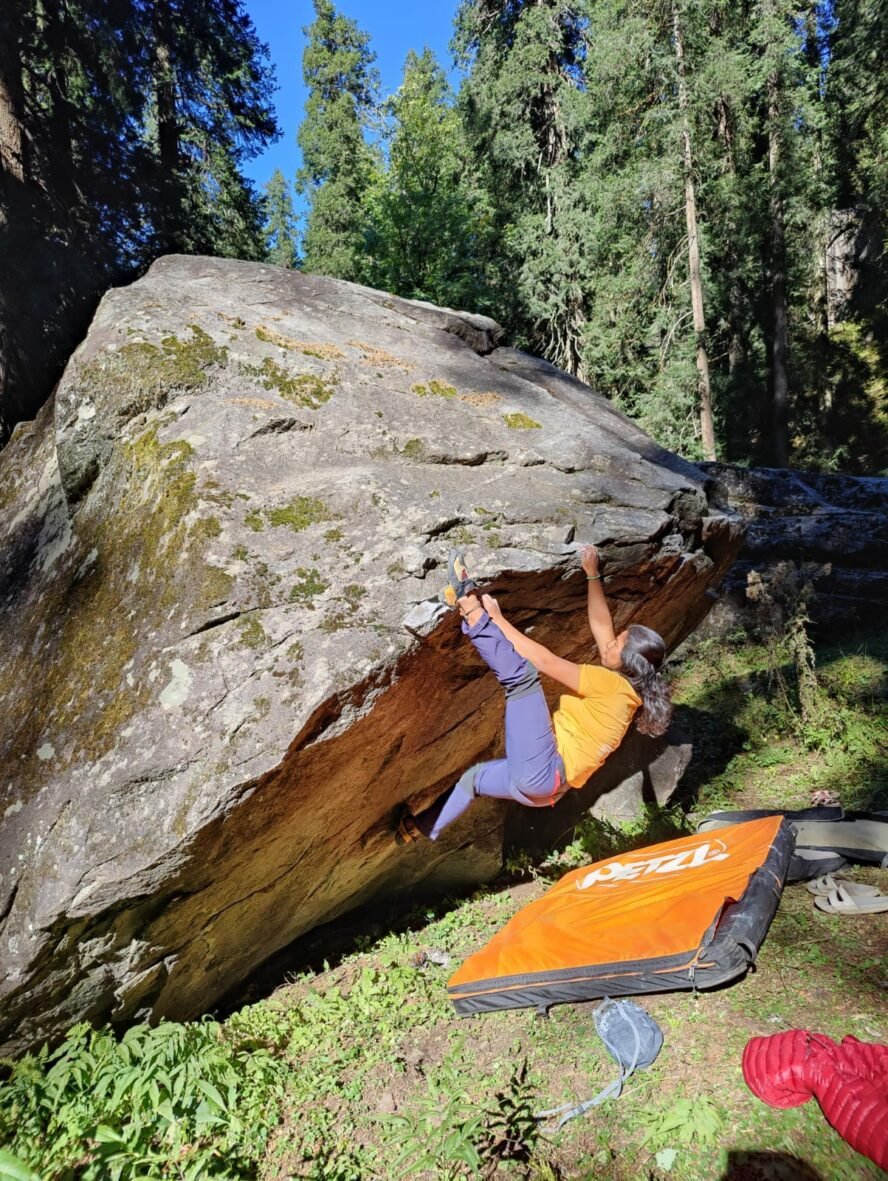 The juggy holds make this problem look easy but topping out is a hard mantle sequence