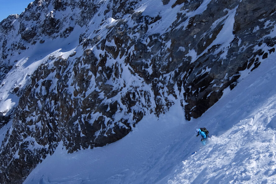 Skiing the upper part of la Voûte, before the entrance of the couloir, in the hautes alpes, france