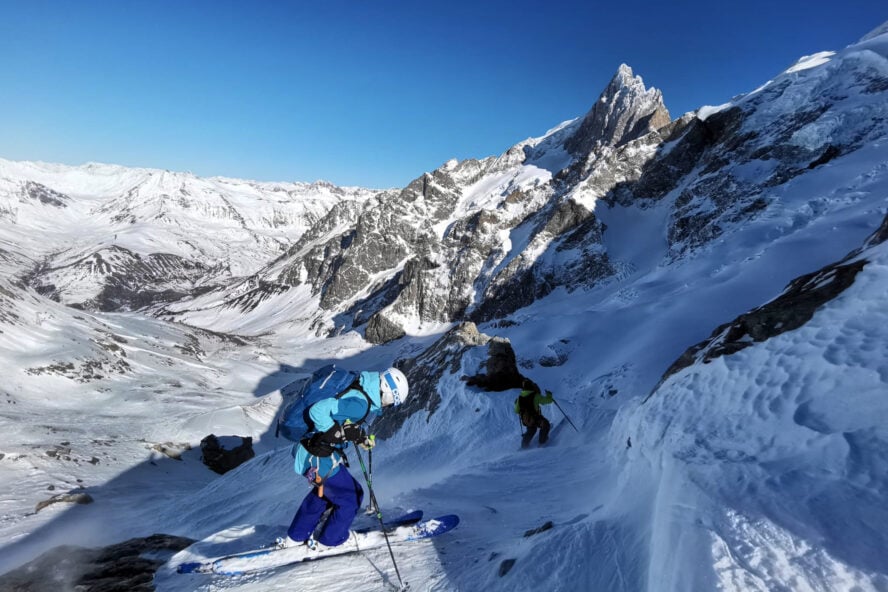 Navigating the tricky entrance of couloir Trifide 1, a technical variant of the Vallons de la Meije