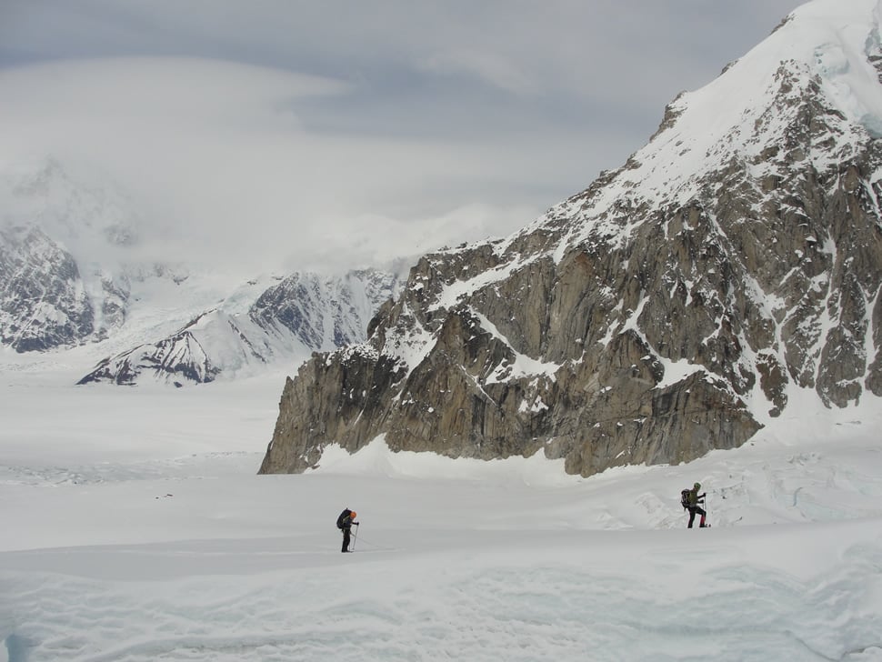 Mountaineers in Alaska with some mountains in the background