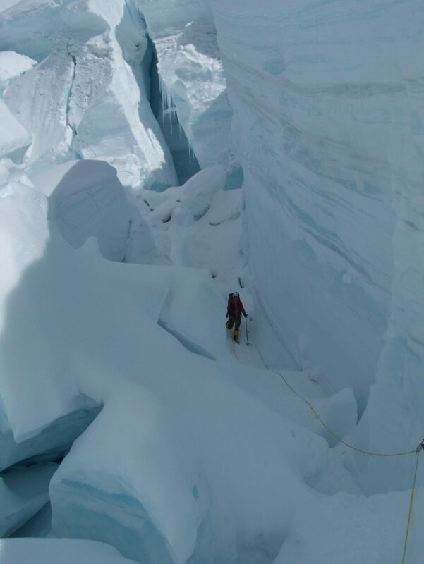 A mountaineer in a glacier in Alaska