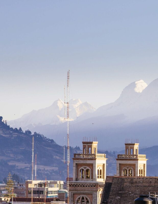 Rooftops in Huaraz with the mountains in the background