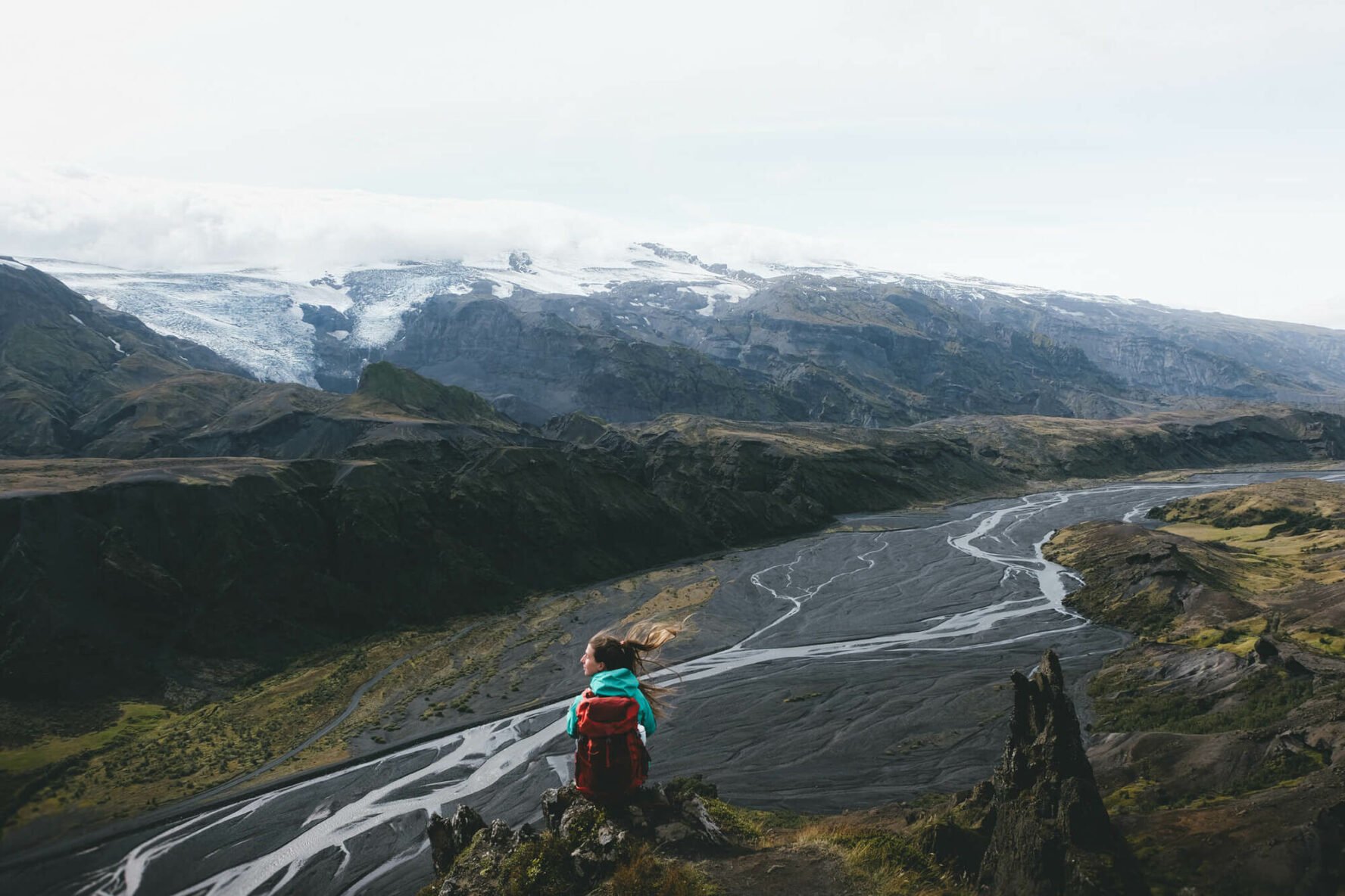 A woman posing on some cliffs in Thorsmörk