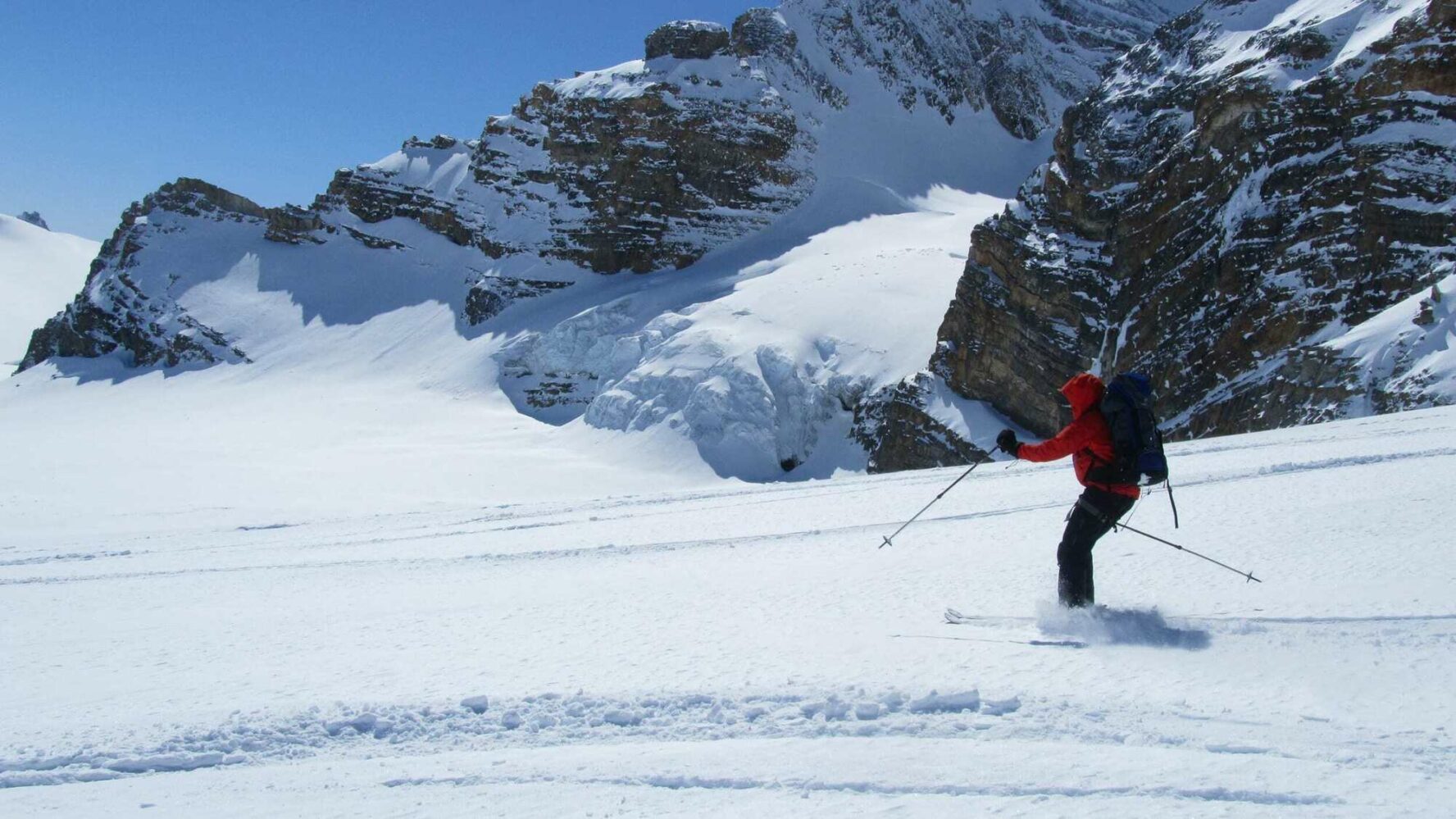 A skier riding along the Wapta Traverse