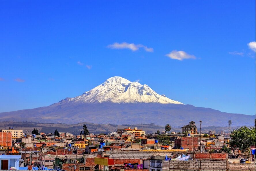 Chimborazo, the tallest volcano in Ecuador, watches over the city of Riobamba.